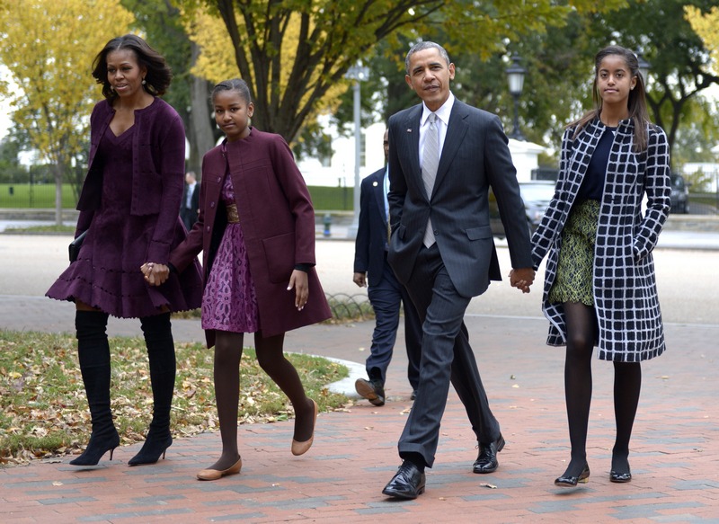 Barack Obama with his kids and wife